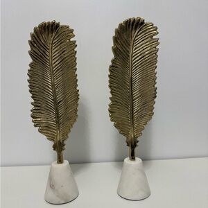 Luxurious Gold Leaf Ornaments on Marble Stand